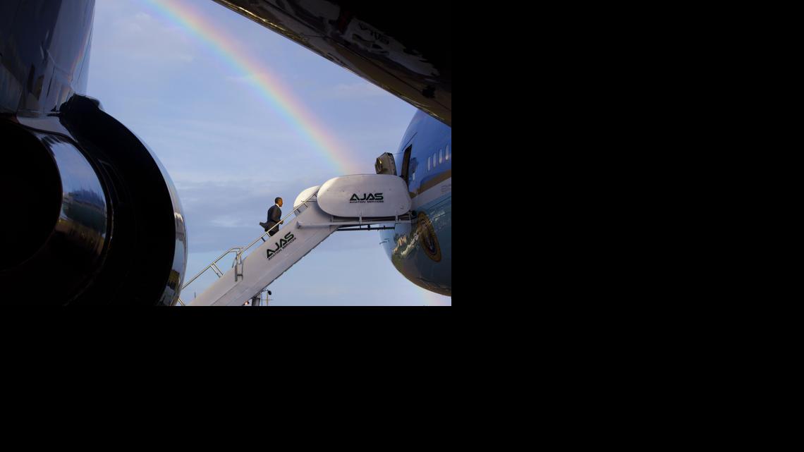 
A rainbow is seen as U.S. President Barack Obama boards Air Force One, Thursday, April 9, 2015, at Norman Manley International Airport in Palisadoes, Jamaica. 

