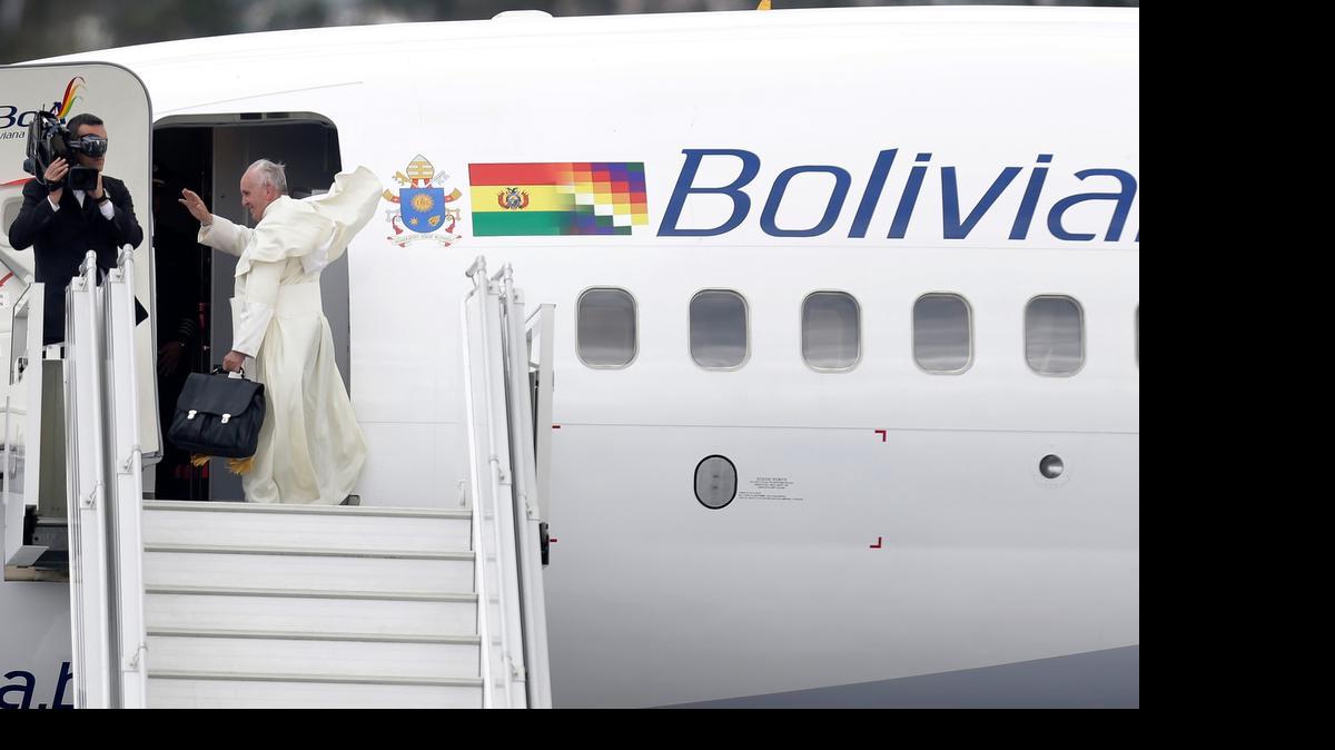 
Pope Francis waves goodbye as he prepares to depart Mariscal Sucre airport in Quito, Ecuador, Wednesday, July 8, 2015. The pope is departing for Bolivia, as part of his three-nation tour of South America. 
