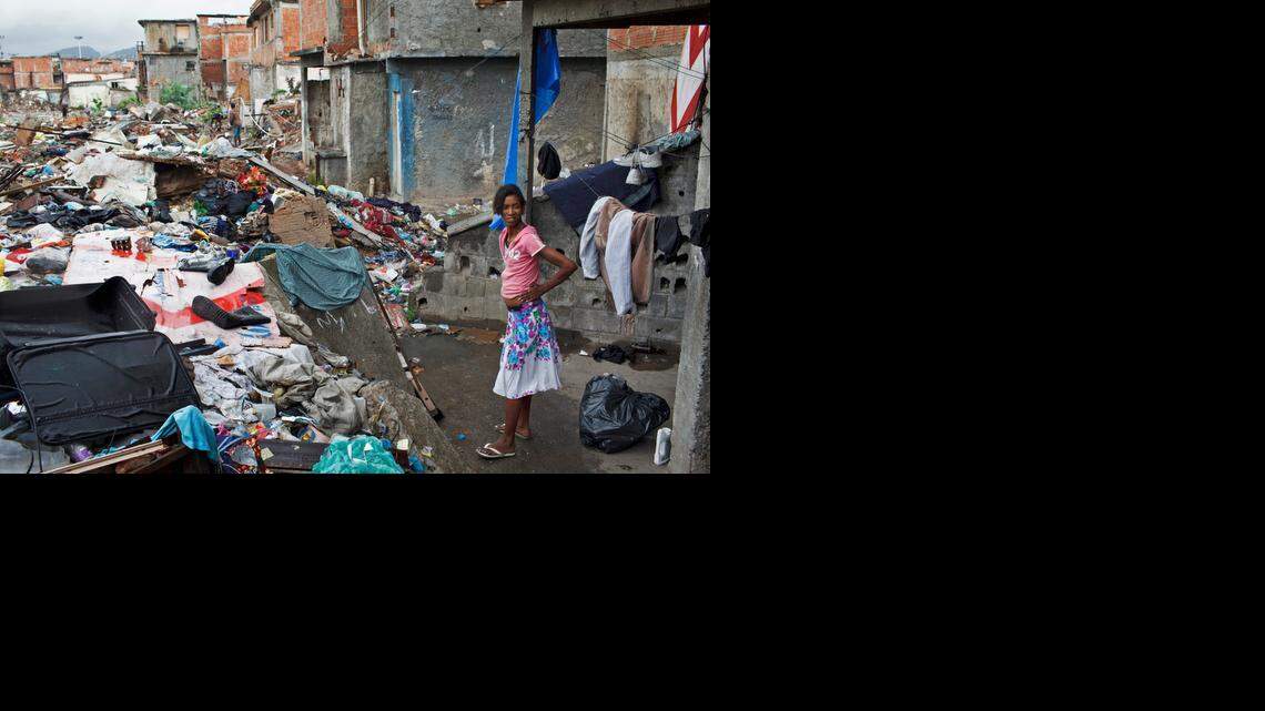 
Thais Nascimento Silva, 26, lives in what is left from a building in the Metro Favela in Rio de Janeiro. 
