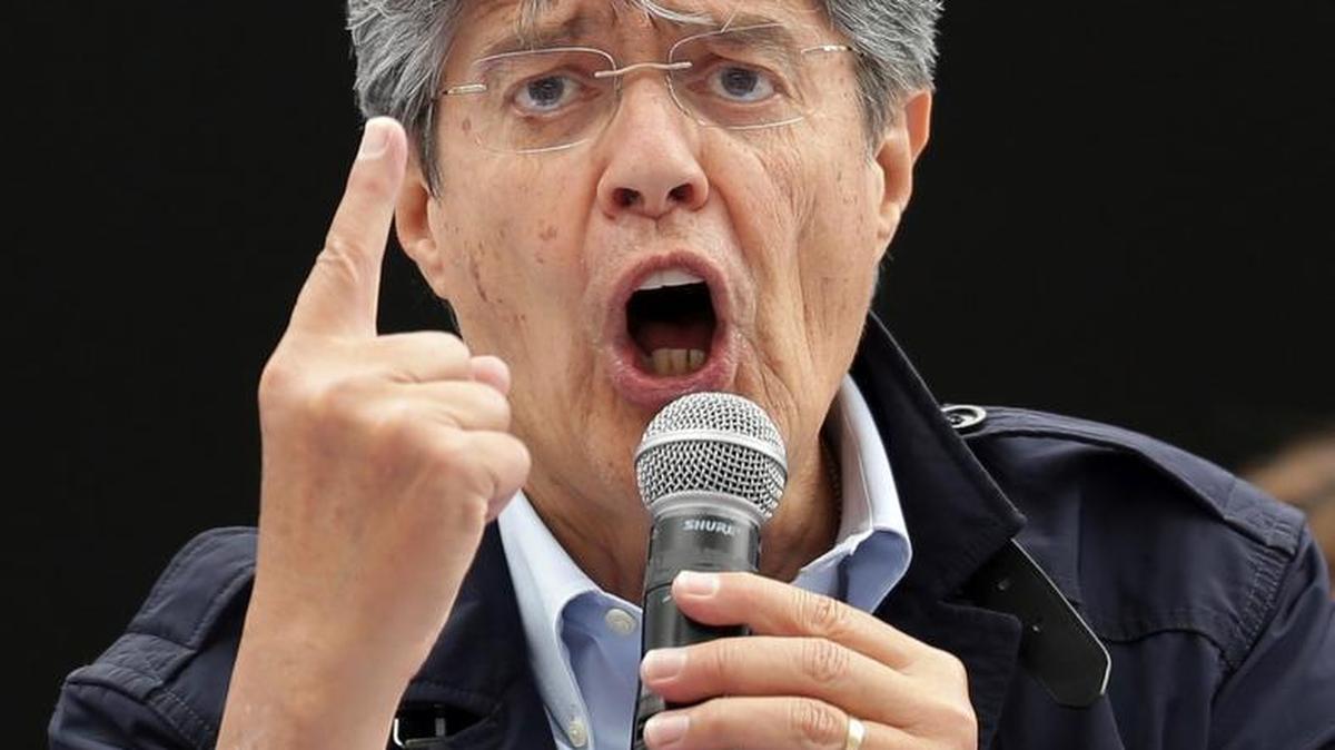 Guillermo Lasso, presidential candidate for the party Creando Oportunidades, CREO, speaks to supporters during a campaign event in Quito, Ecuador, Wednesday, Feb. 15, 2017.