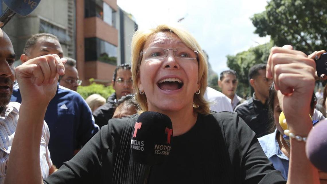 Venezuela’s ousted top prosecutor, Luisa Ortega, speaks to the media outside her office after security forces surrounded the entrance, in Caracas, Venezuela, on Aug. 5, 2017.