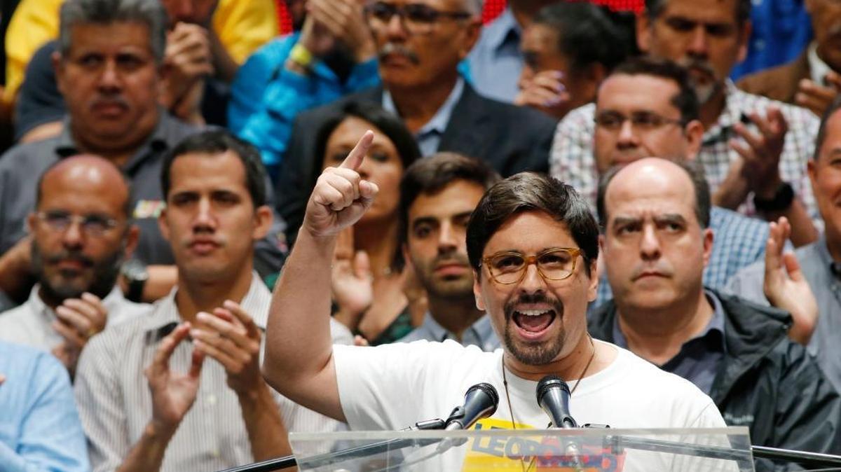 National Assembly first Vice President Freddy Guevara speaks to the press accompanied by fellow lawmakers in Caracas, Venezuela, Monday, July 17, 2017. Venezuelan opposition leaders called Monday for escalated street protests after more than 7 million people rejected a government plan to rewrite the constitution and consolidate power over the country.