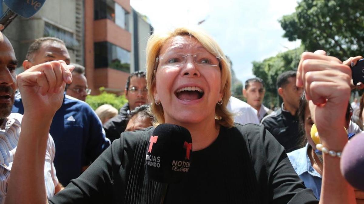 Venezuelan attorney general Luisa Ortega speaks to reporters outside her office in Caracas after security forces surrounded the entrance Saturday. She was later dismissed by a new all-powerful constituent assembly.