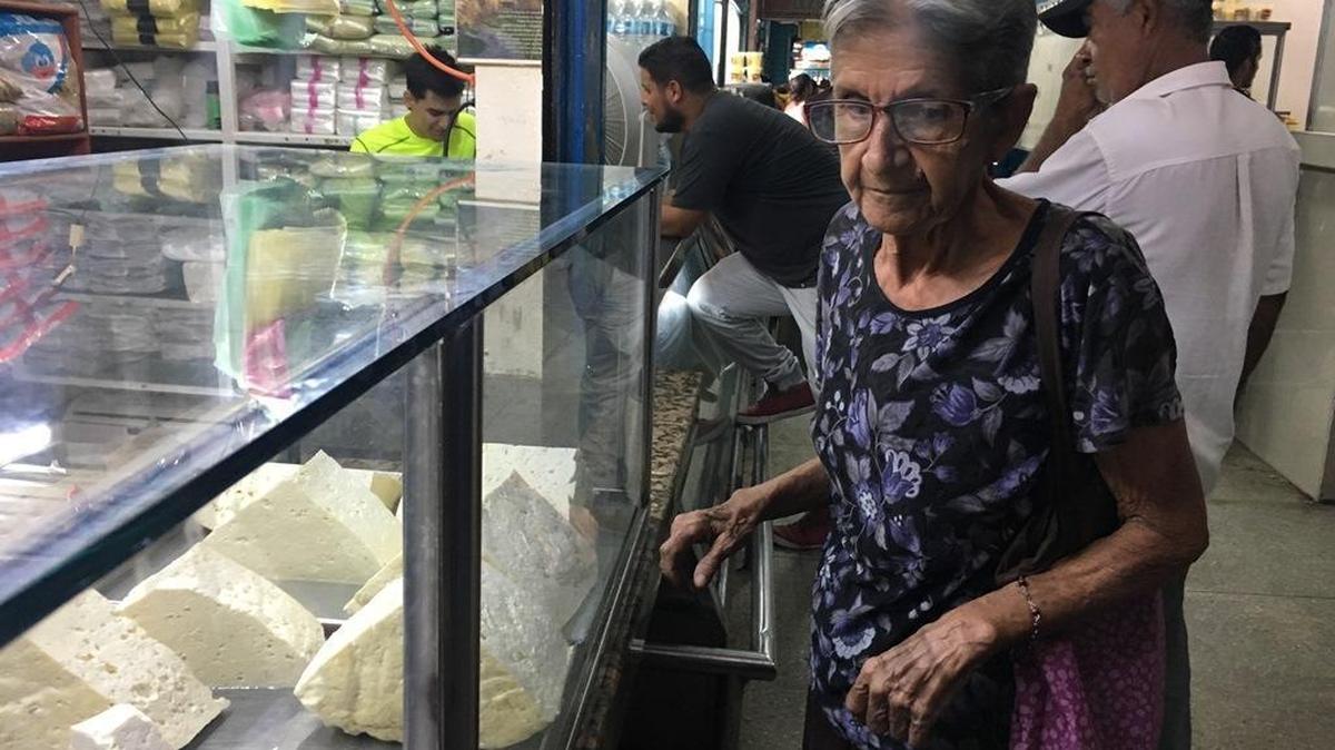Maritza Díaz in Maracaibo, Venezuela, complained that the price of a kilo of cheese had doubled within a week. The country’s rampant inflation is upending traditional Christmas meals.