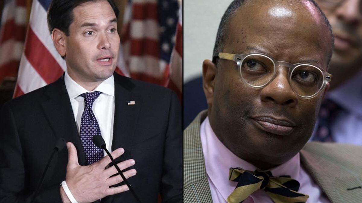 Sen. Marco Rubio, left, and U.S. diplomat Todd Robinson