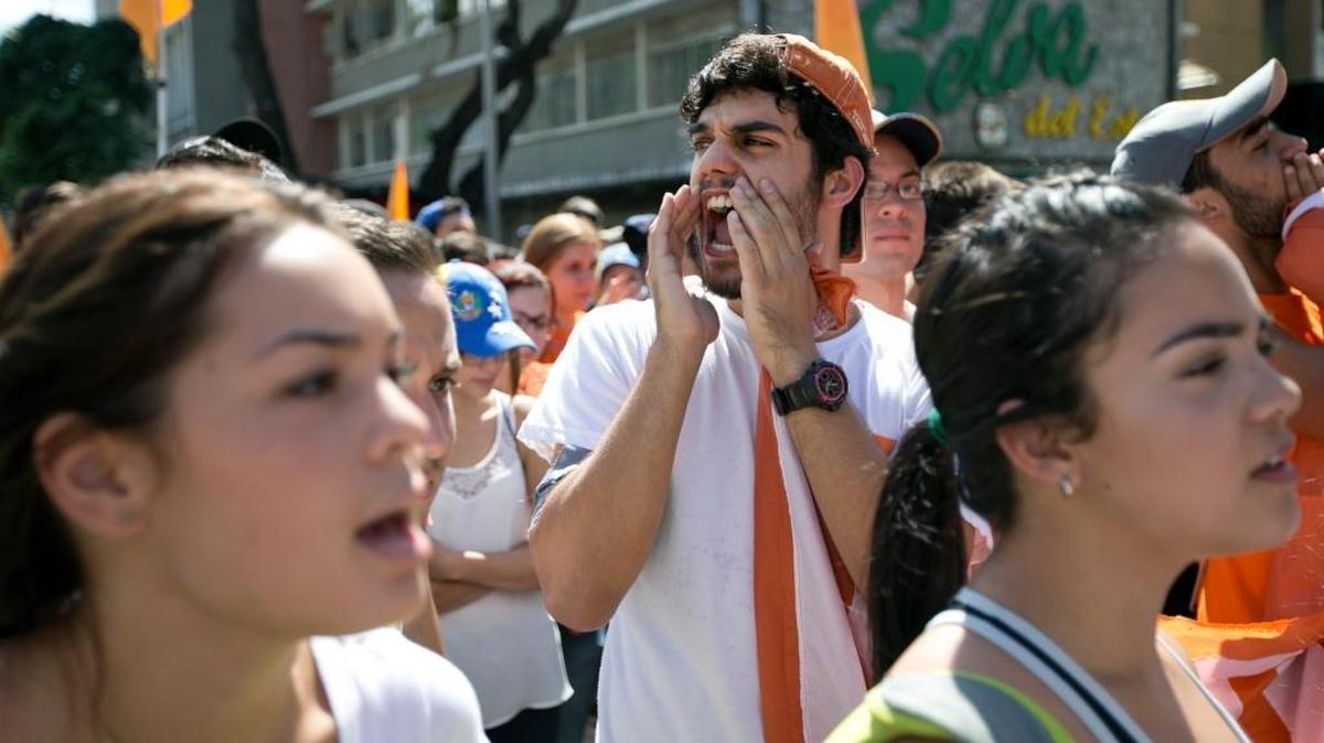 University students protest against President Nicolás Maduro in Caracas, Venezuela, on Thursday, Nov. 3, 2016. The students are demanding that Maduro respect the constitution and allow an electoral solution to the country's political crisis.