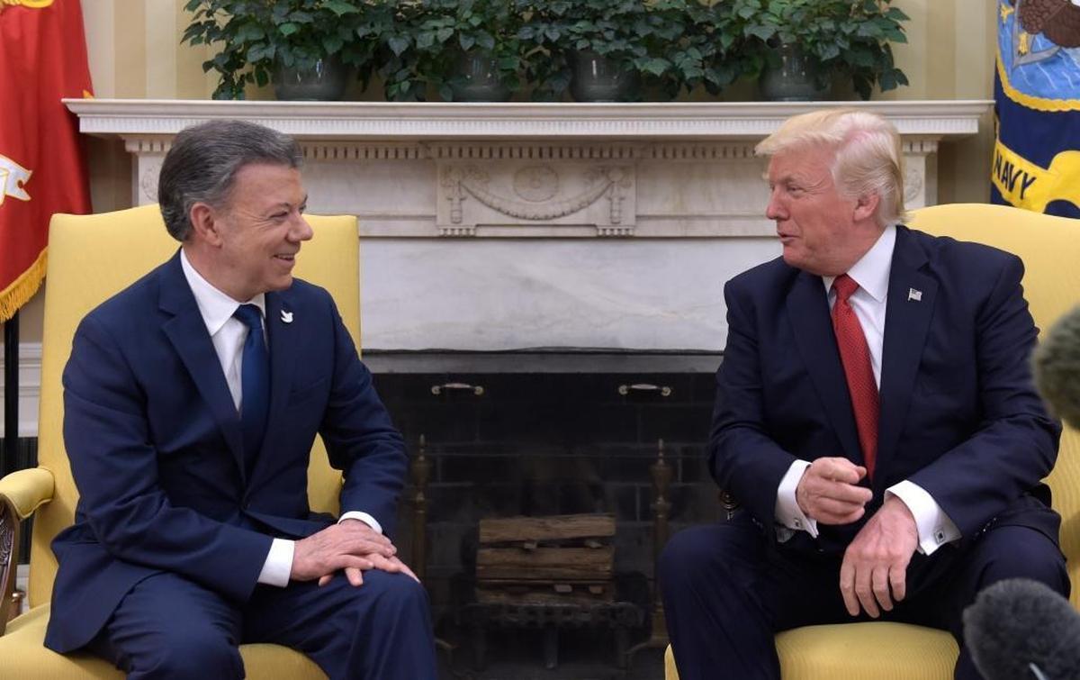 President Donald Trump meets with Colombian President Juan Manuel Santos in the Oval Office on Thursday. Trump said they’d talk about Venezuela.