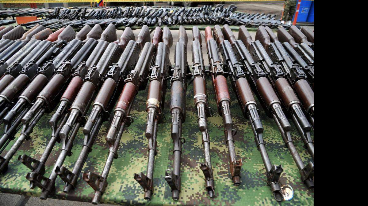 
Part of the 9,517 weapons seized from FARC and ELN guerrillas, criminal gangs and organized crime are on display before being melted in furnaces of the National Steel Factory on November 25, 2014. Liborio Guarulla, governor of Venezuela’s Amazonas state, says his community is being overrun by Colombian guerrillas.


