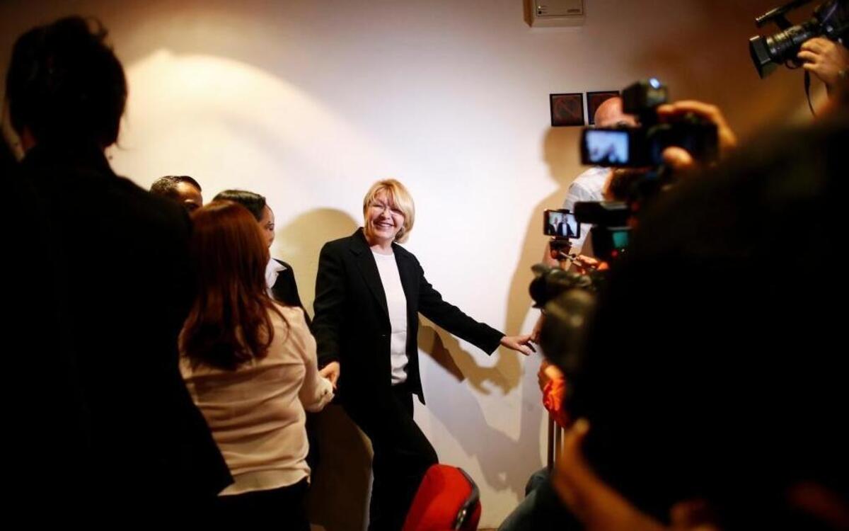 Venezuela’s chief prosecutor, Luisa Ortega, greets employees and journalists after a news conference at her Caracas office Monday.