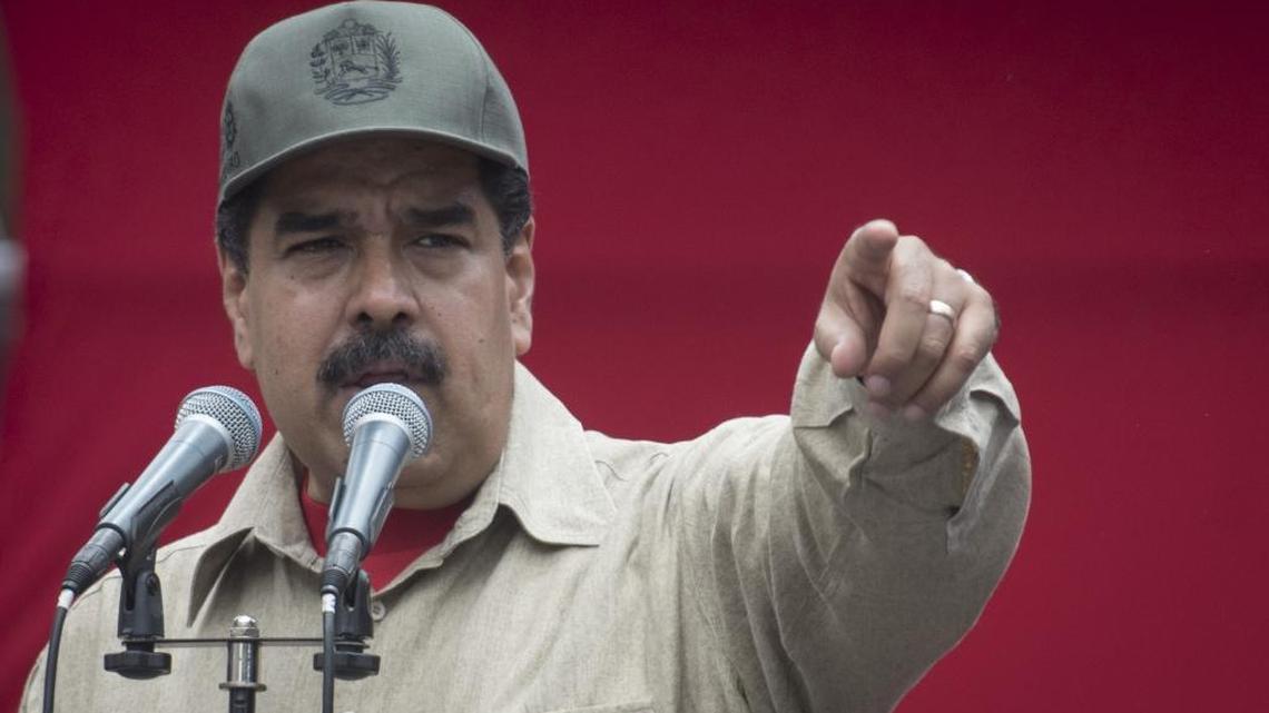 Nicolas Maduro, president of Venezuela, speaks during a ceremony with militia members in Caracas, Venezuela, on Monday, April 17, 2017. Maduro approved a plan for Defense Minister Vladimir Padrino Lopez to expand Venezuela's voluntary militia forces to 500,000 men and equip each of them.