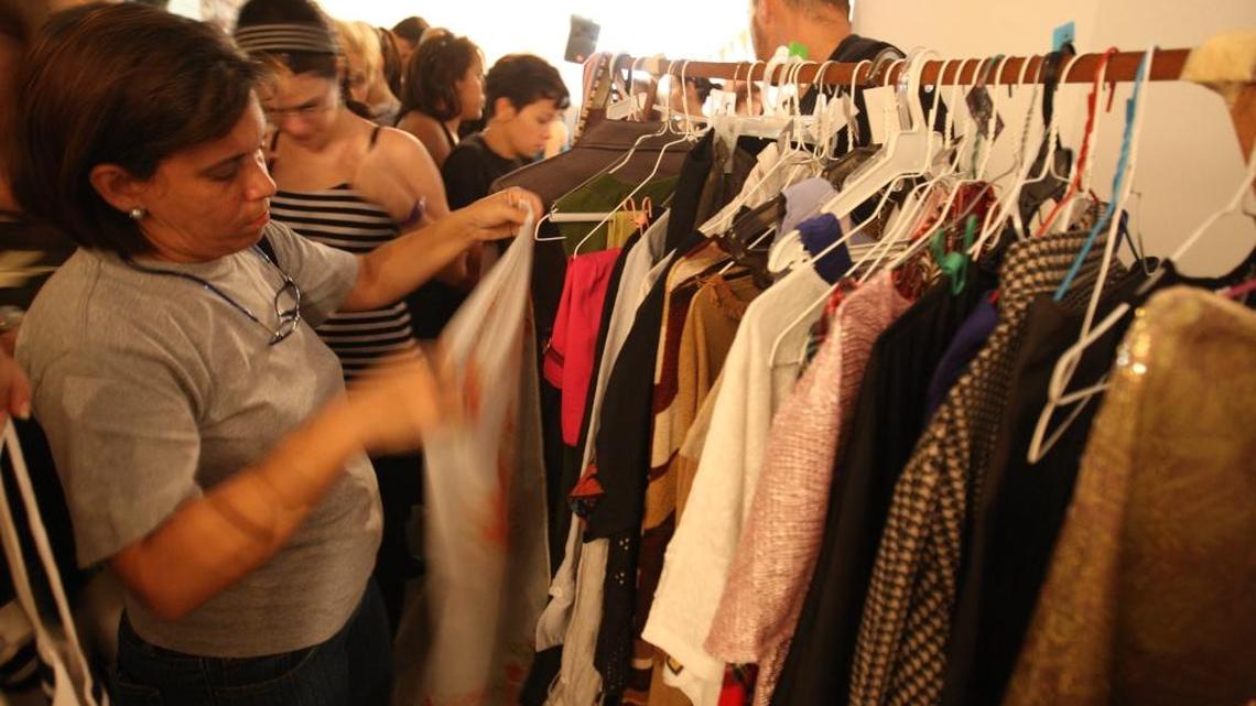 Antiques, used clothing, collectibles and other objects are being sold in Venezuelan markets and garage sales