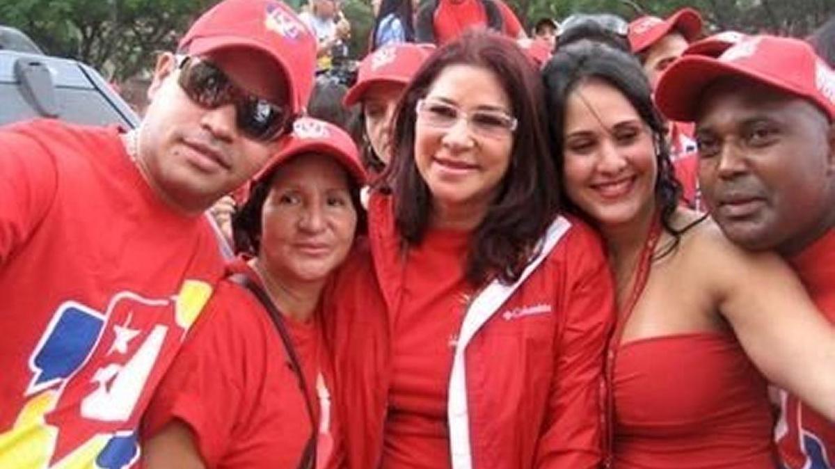 Yazenky Antonio Lamas Rondón, left, in a group with Venezuela’s first lady, Cilia Flores, third from the left, along with unidentified people.