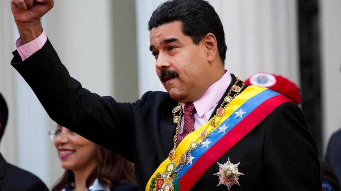 
Venezuela's President Nicolas Maduro, gestures with his fist during his arrival to the National Assembly in Caracas, Venezuela, Monday, July 6, 2015. Maduro announced Monday that Venezuela was recalling its ambassador in Guyana for consultation amid mounting tensions over their disputed border and that he is also initiating a comprehensive review of relations with the much smaller neighbor. 

