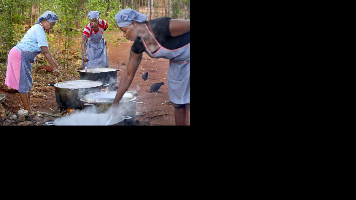 
As part of the government's emergency response, community kitchens like this were launched on Ile de la Tortue off the northwestern coast of Haiti. The women cook the meals and then sell them to villagers. While a welcomed effort, the women say the demand for the subsidized meals is more than they can meet.
