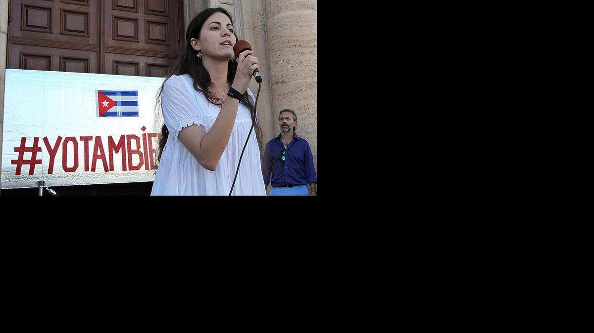 
Speaking out: Rosa Maria Paya, daughter of Cuban political dissident Oswaldo Paya Sardiñas, takes her turn during an open mike performance rally at the Freedom Tower in Miami.
