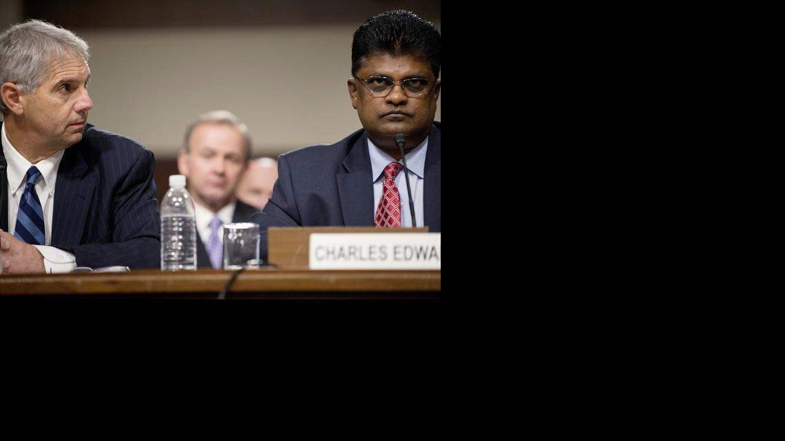 
Mark Sullivan (L), Director of the United States Secret Service, looks toward Charles K. Edwards, Acting Inspector General of the US Department of Homeland Security, during a a hearing of the Senate Homeland Security and Government Affairs Committee on Capitol Hill May 23, 2012 in Washington, DC. Sullivan was called to testify about the prostitution scandal involving members of the Secret Service in Cartagena, Columbia prior to a visit by President Barack Obama. 

