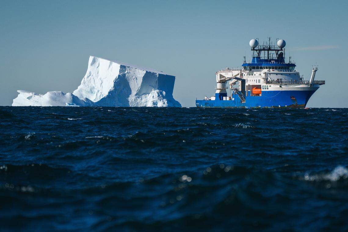 The research ship Falkor (too) seen near an iceberg in the Southern Ocean.