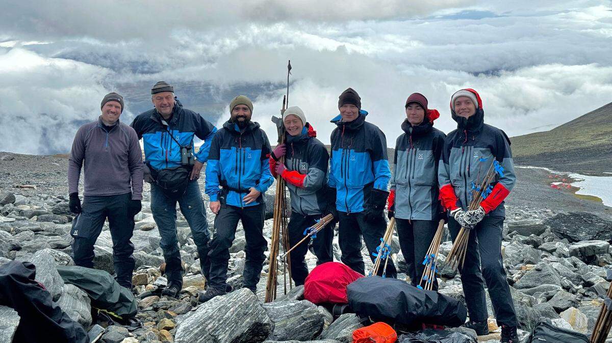 Archaeologists surveying the Lendbreen glacier found a centuries-old woven textile and a leather or hide item melting out of the ice, photos show.