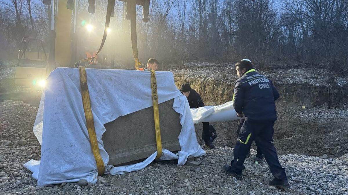 A man stumbled on a massive ancient Roman artifact buried in a gravel riverbed in San Vito al Torre, archaeologists said and photos show.