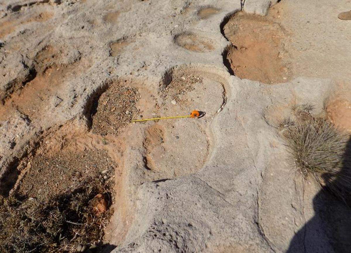 A spot where several ancient grinding stones were removed and left a clover leaf shape.