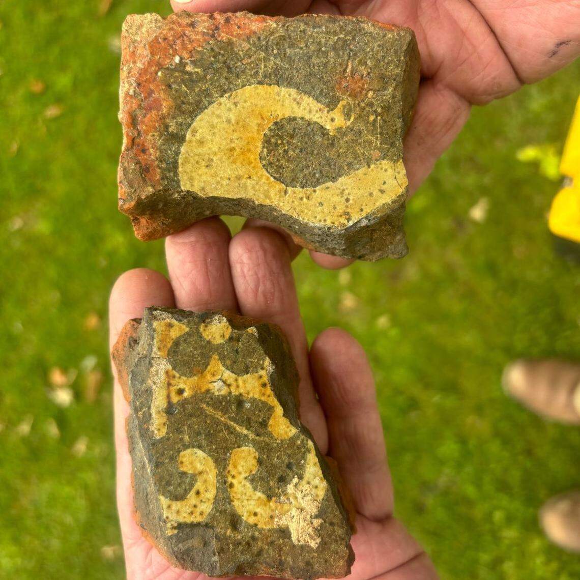 A medieval decorated tile found at the park.
