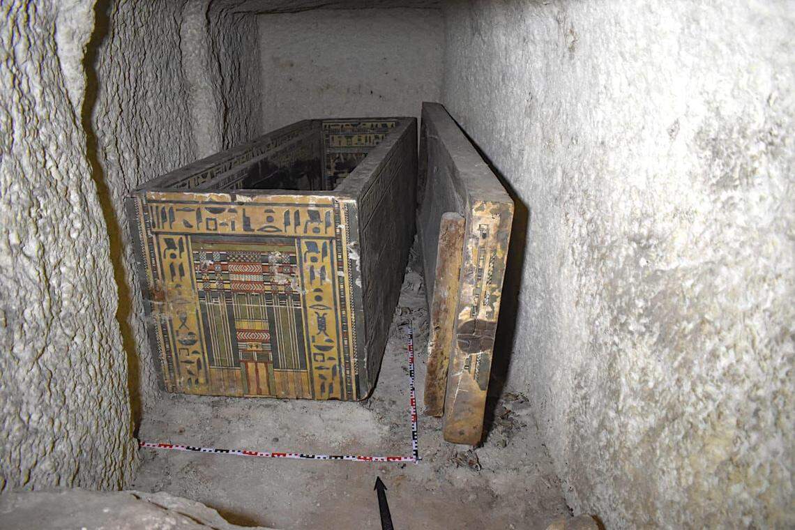 An ancient wooden coffin found inside the burial chamber.