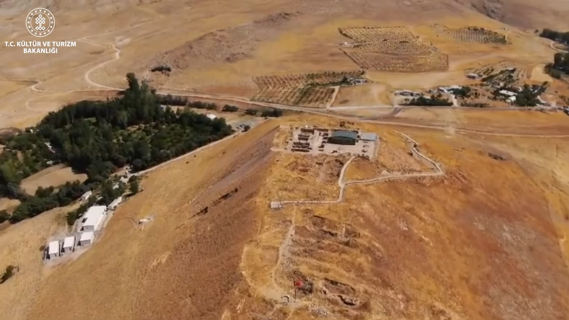 Archaeologists excavating an ancient Urartian temple uncovered three shields and a helmet left as offerings for a war god, photos show.