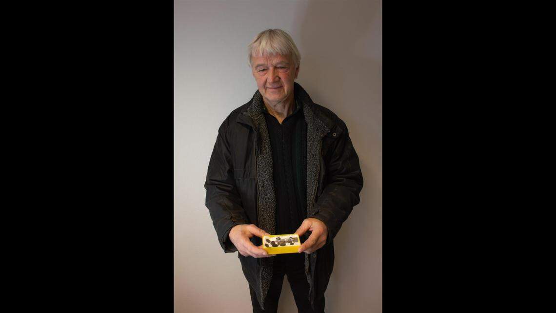 Two boys found some rare 600-year-old coins under a church in Norway and kept the treasure in a box for decades, archaeologists said and photos show.