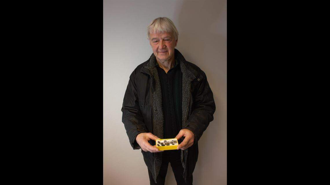 Two boys found some rare 600-year-old coins under a church in Norway and kept the treasure in a box for decades, archaeologists said and photos show.