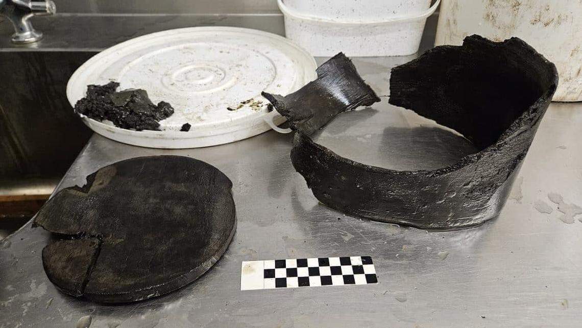 The 500-year-old grain measuring tool found in the sewage pit.