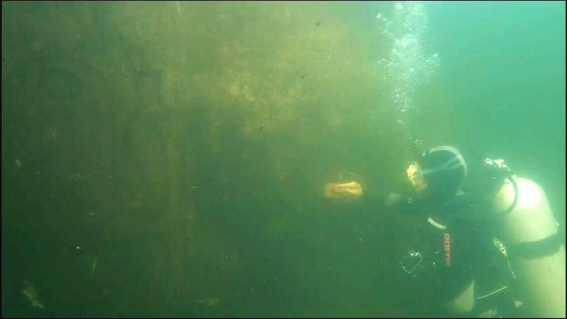Scuba divers found several 2,300-year-old rock carvings linked to Egyptian pharaohs under the Nile River, archaeologists said and photos show.