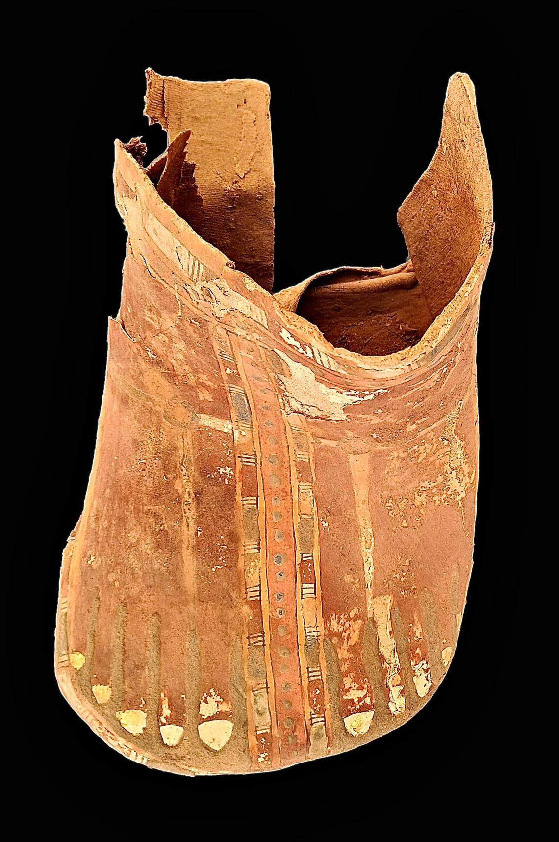 An artifact with a foot design found at the ancient cemetery.
