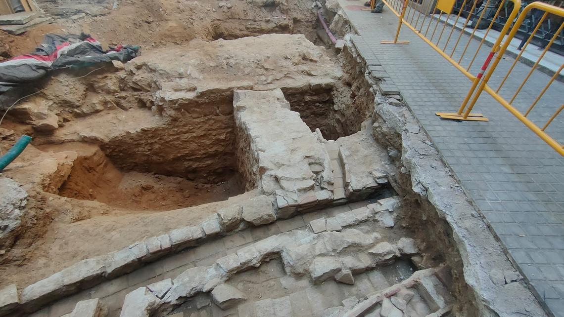 The medieval wall found in downtown Barcelona.