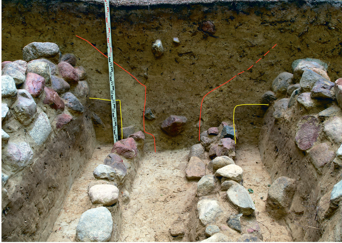 One of the 900-year-old graves at Nowy Chorów showing signs of being reopened (red lines).