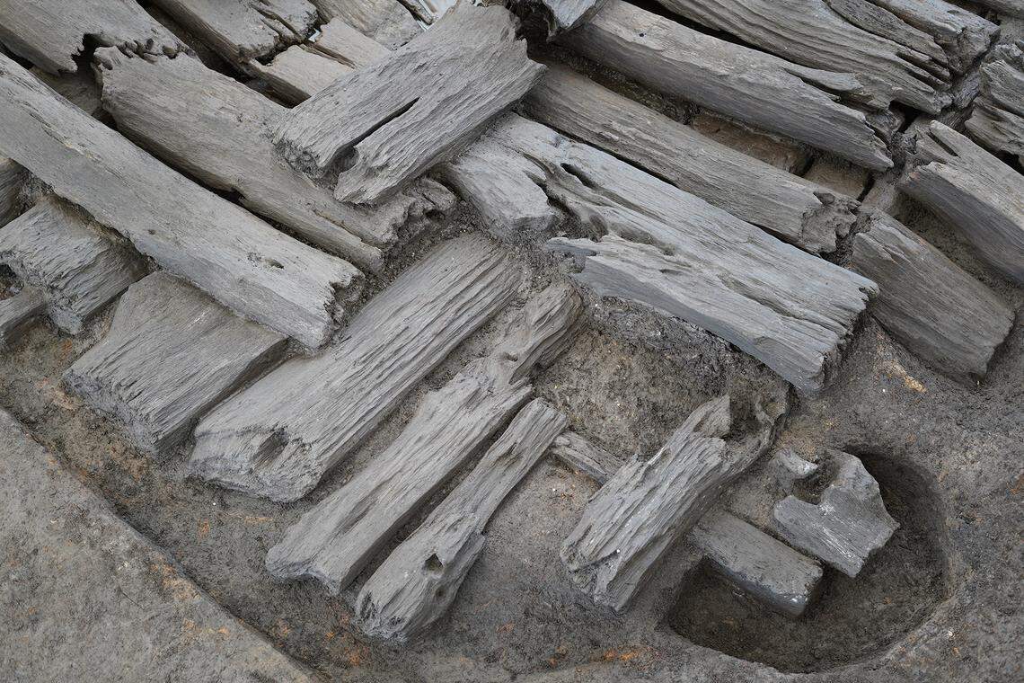 A corner hole where grave robbers entered the ancient chamber.