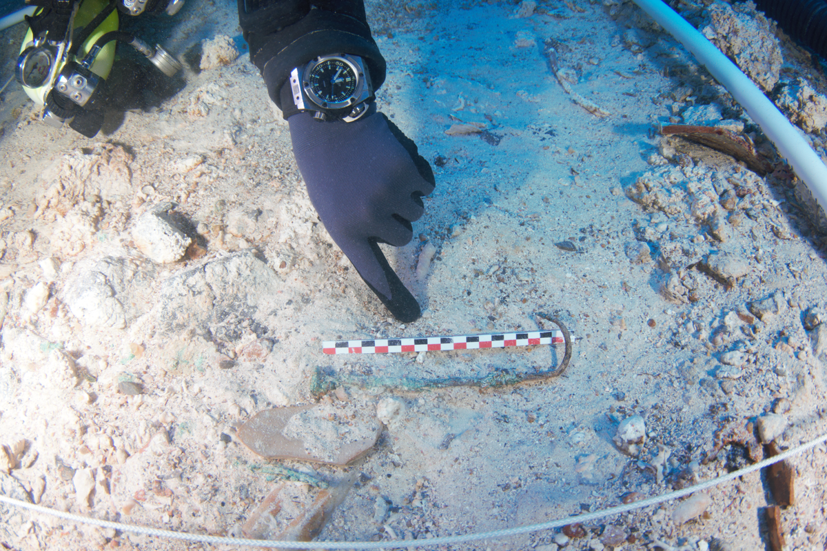 A hook-like artifact found at the ancient shipwreck.