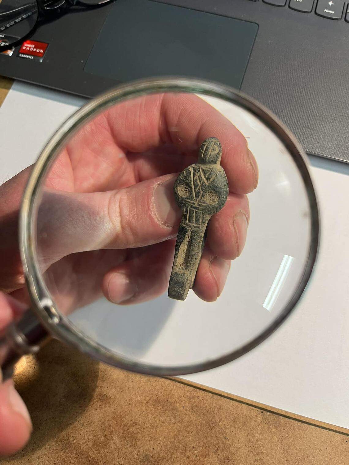 A close-up view of the human-shaped medieval loop.