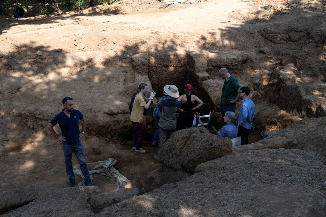 The team working near the 2,600-year-old tomb at the necropolis of San Giuliano