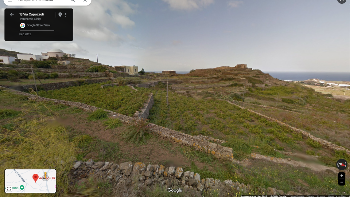 Rains on an island in Italy revealed more than two dozen 2,000-year-old coins likely hidden during a pirate attack, archaeologists said and photos show.