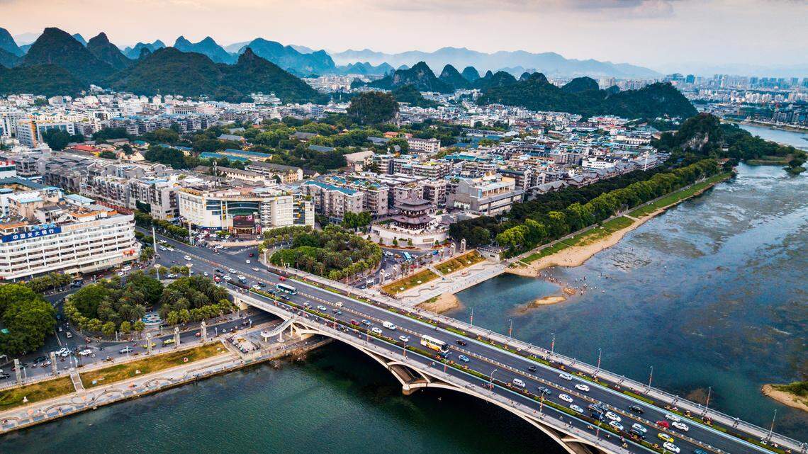 Scientists found a scaly brown animal pregnant with two eggs in a Guilin suburb and discovered a new species, a study said.