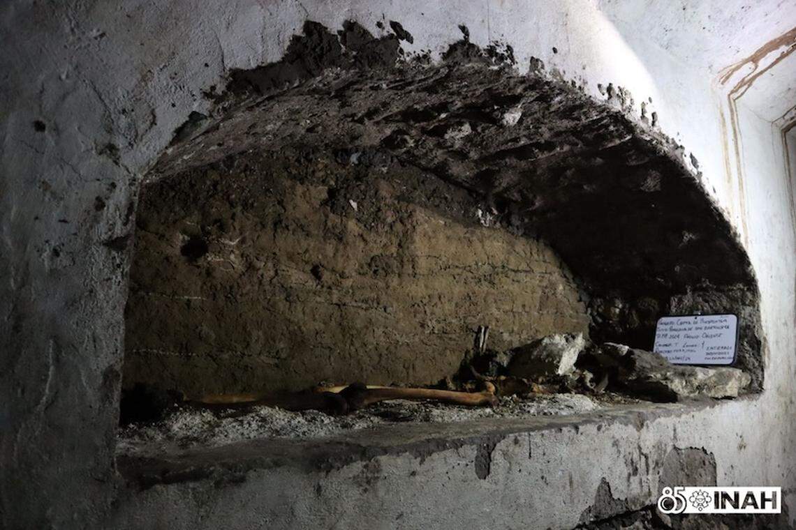 Another grave, T1, found in the church crypt.