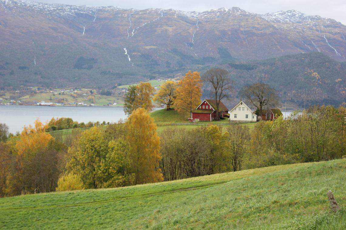 The Karnilshaugen mound (left) as seen from afar.