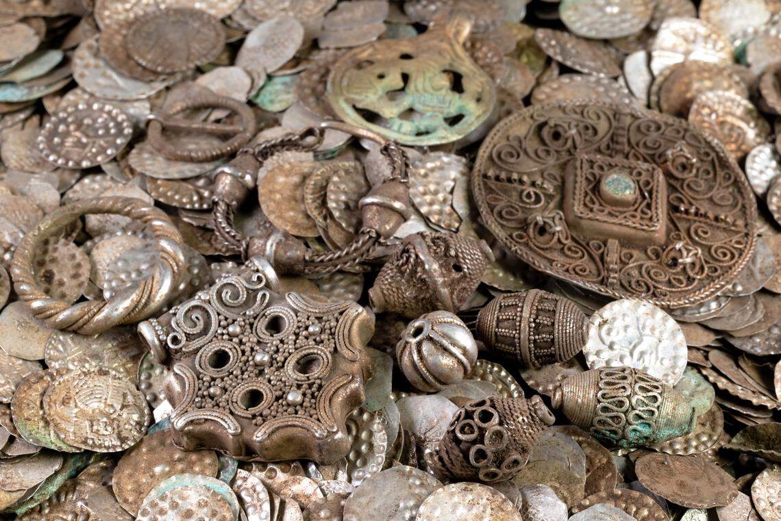 Some of the 800-year-old silver treasures found by a person in Stockholm County.