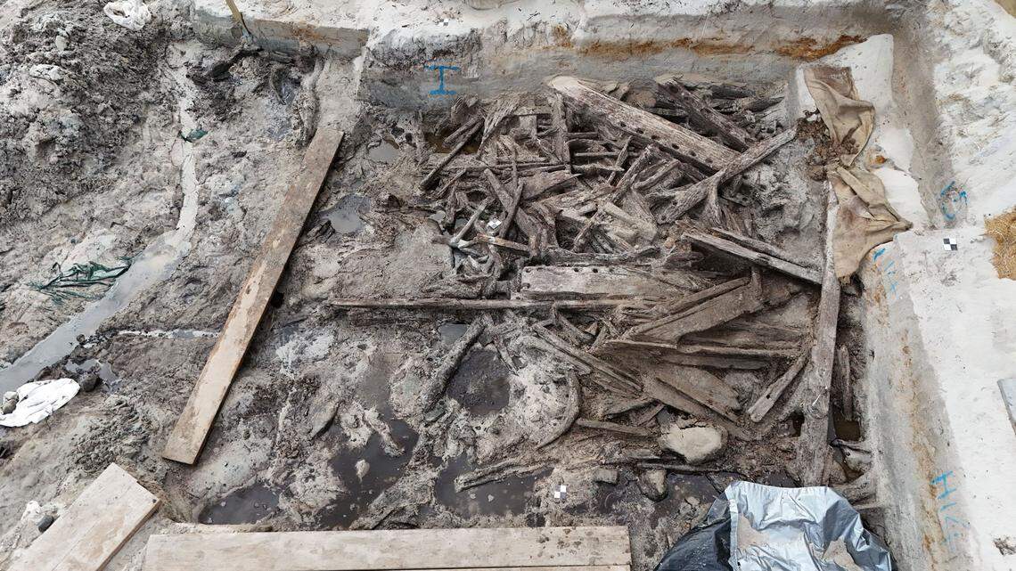 Many fragments of a historic wooden canoe seen during the Chatham Island excavation.