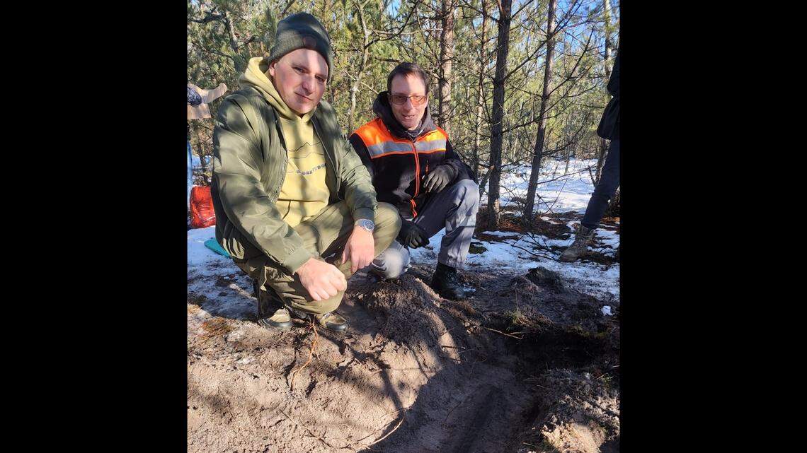 Metal detectorists searching a snowy forest in Poland for World War II artifacts uncovered an older and rarer weapon, photos show.