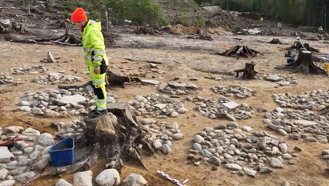 An archaeologist looks at the 2,200-year-old burial ground for young children.