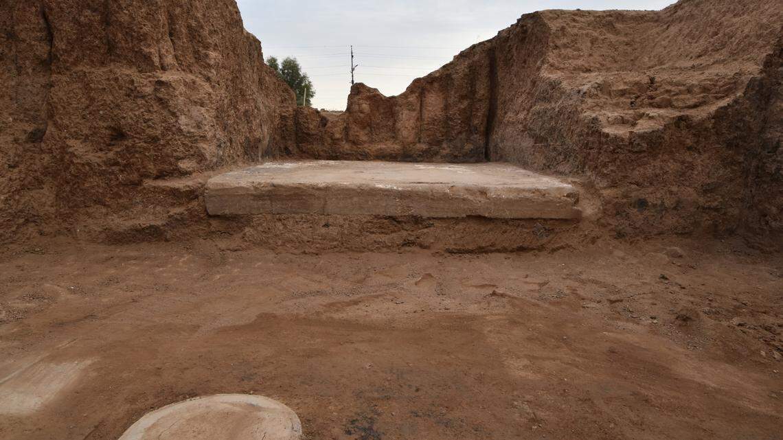 Archaeologists in Iraq excavated a 2,600-year-old temple and found shrines, a stone monument and written tablets, photos show.