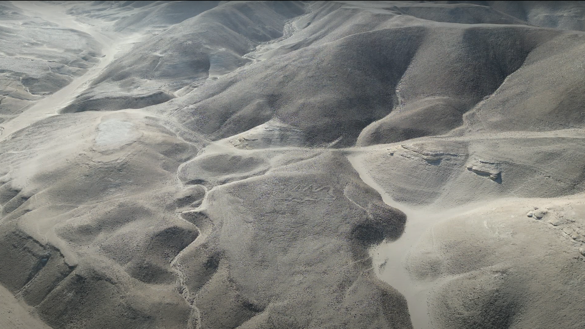 Archaeologists used artificial intelligence to help locate over 300 ancient Nazca geoglyphs near desert trails, study said and photos show.