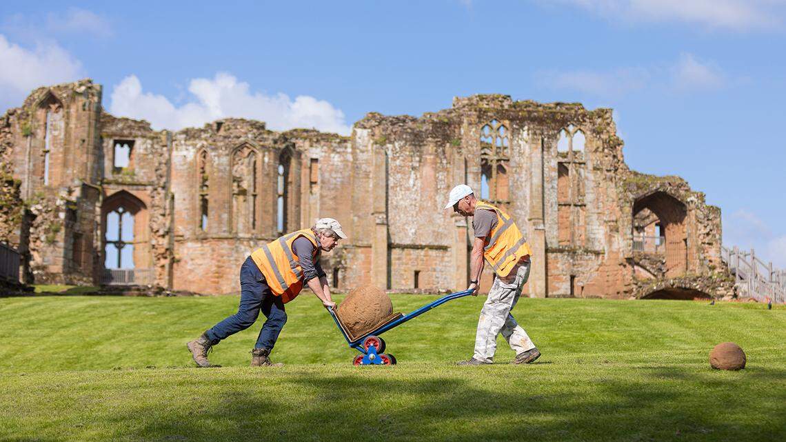 Workers and archaeologists found eight “giant” stones used as catapult ammunition during a medieval siege on a castle in the UK, photos show.