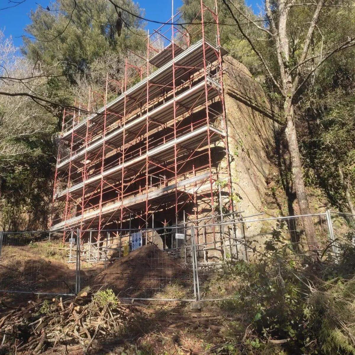 The Queen’s Tomb with scaffolding in front before excavations cleaned the surrounding area.